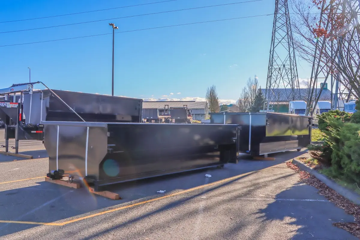 Roll-off dumpster ready for waste disposal at job site for Demolition Dumpster Rental in Wake Village